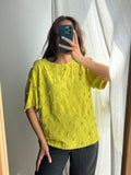 Blusa lime con margherite