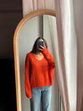 Maglione arancione squadrato