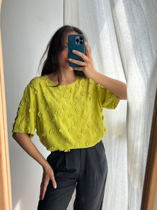 Blusa lime con margherite