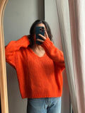 Maglione arancione squadrato